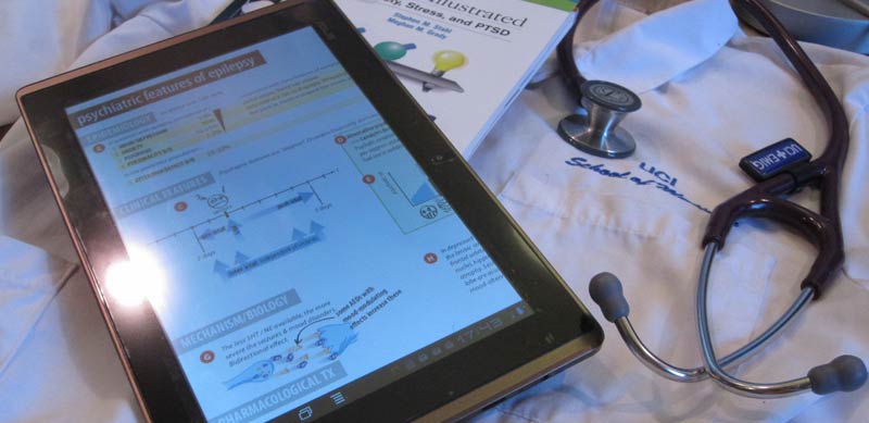 I use an Android tablet while in the hospital, and no, UC Irvine doesn't give all medical students an iPad
